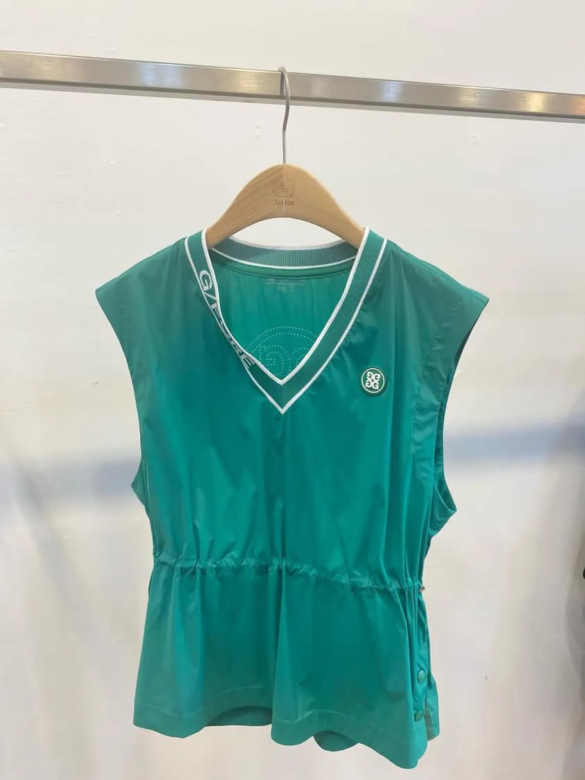 Green golf vest